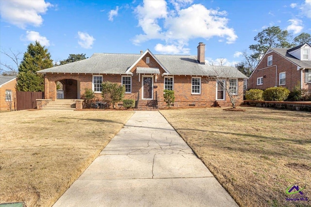 ranch-style house with a front yard