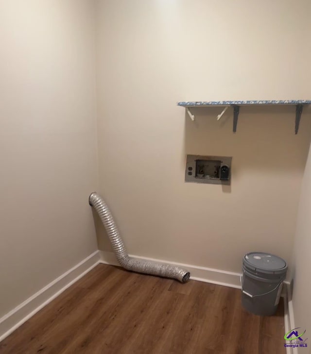 laundry area with hookup for a washing machine and dark hardwood / wood-style floors