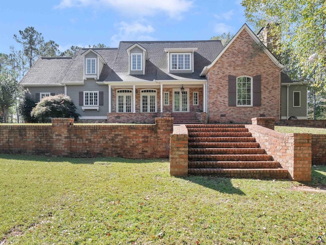 view of front of house featuring a front lawn