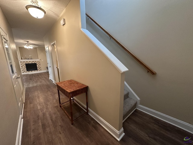 hall with dark hardwood / wood-style flooring