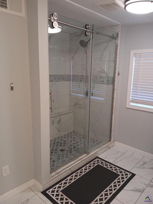 bathroom with an enclosed shower