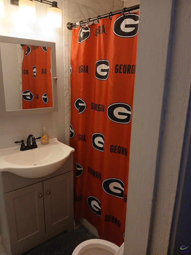 bathroom with vanity and curtained shower