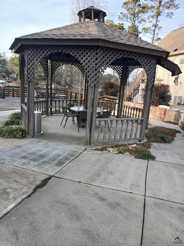 view of community featuring a gazebo and a patio