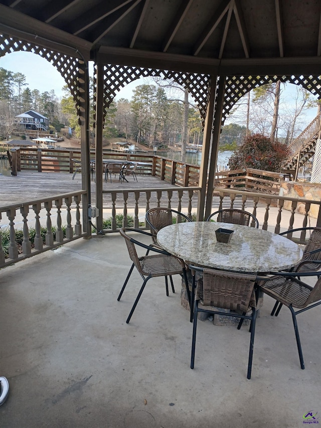 view of patio / terrace featuring a gazebo and a deck