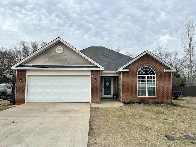 ranch-style house with a garage and a front lawn