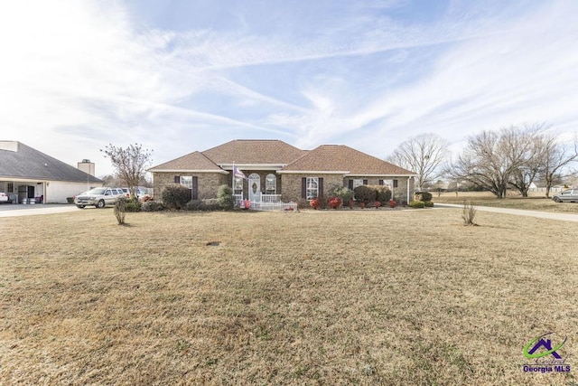 ranch-style house with a front yard