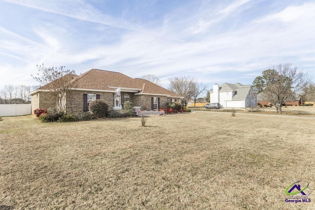 exterior space featuring a front yard