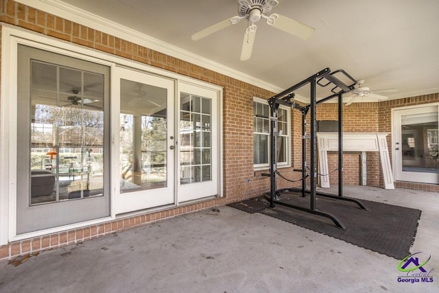 view of patio featuring ceiling fan