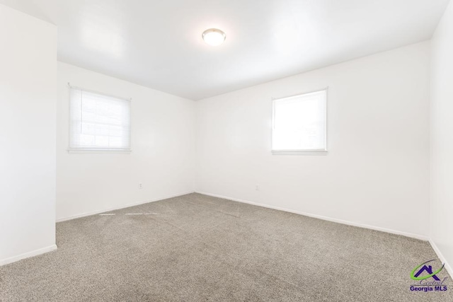 view of carpeted spare room