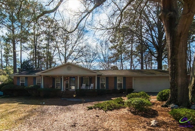 ranch-style house with covered porch