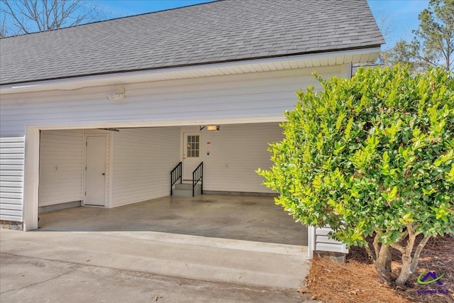 garage with a carport