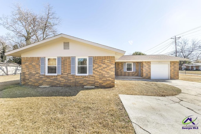 ranch-style home featuring a garage