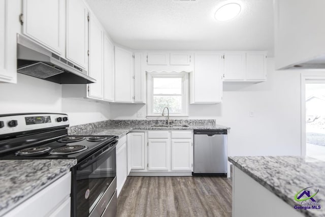 kitchen with sink, electric range oven, stainless steel dishwasher, and white cabinets