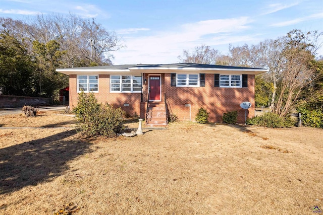 view of front of property with a front lawn