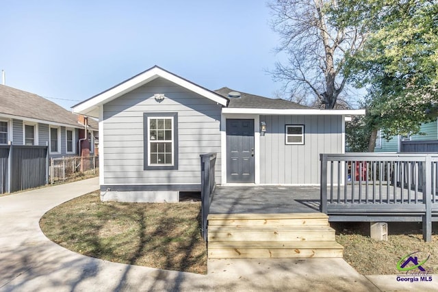 view of front of property featuring a deck