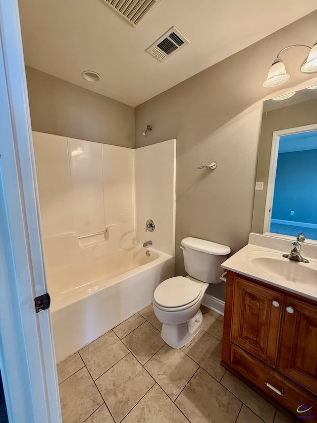 full bathroom featuring tile patterned floors, vanity, toilet, and shower / tub combination