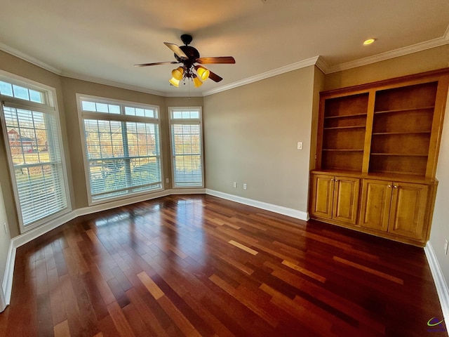 empty room with ornamental molding, dark hardwood / wood-style floors, and ceiling fan