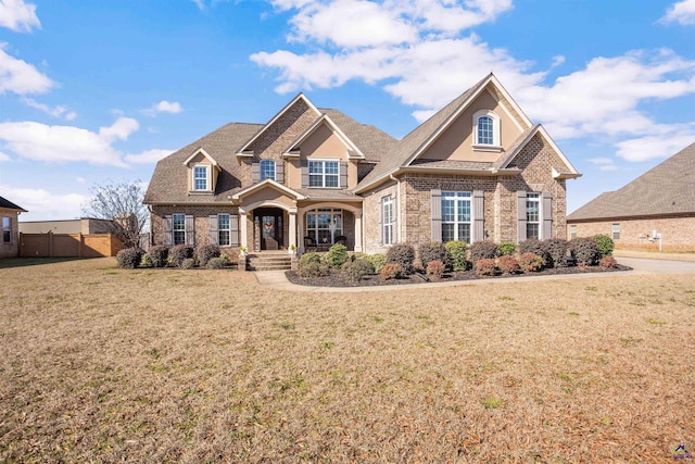 craftsman inspired home featuring a front yard