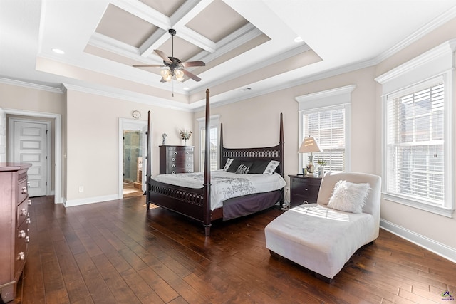 bedroom featuring dark wood-type flooring, crown molding, and multiple windows