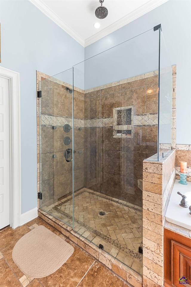 bathroom featuring crown molding and an enclosed shower