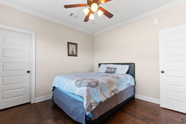 bedroom with ornamental molding, ceiling fan, and dark hardwood / wood-style flooring