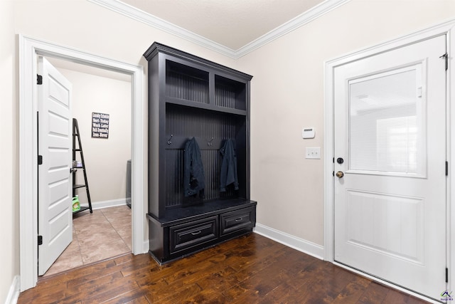 mudroom with dark wood-type flooring and ornamental molding