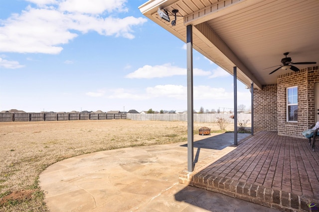 view of patio / terrace featuring ceiling fan