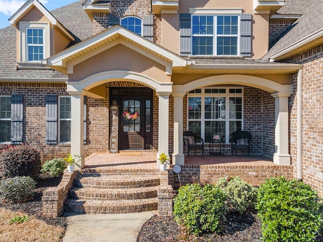 entrance to property with covered porch