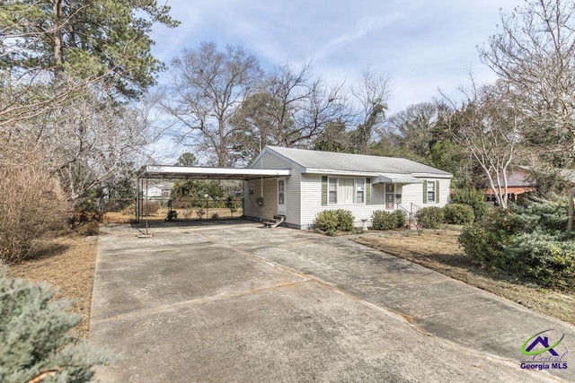 view of front of house with a carport