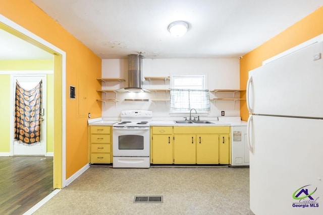 kitchen featuring sink, white appliances, and extractor fan