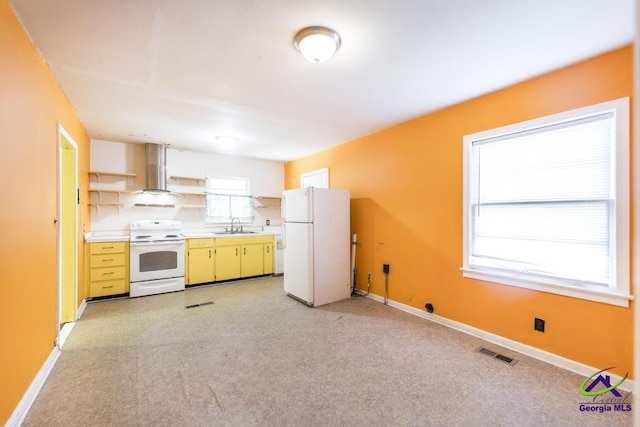 kitchen featuring sink, white appliances, and wall chimney exhaust hood