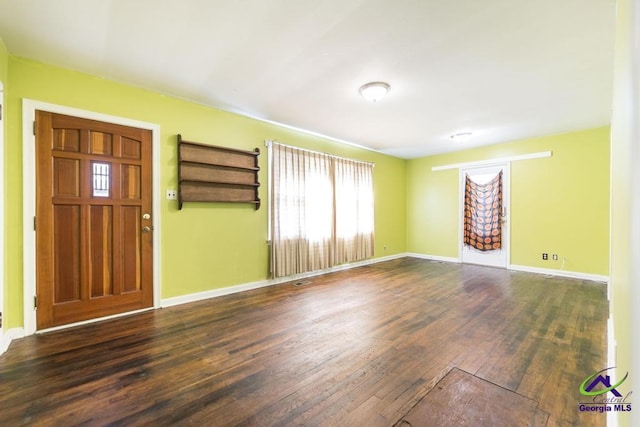 foyer entrance featuring dark hardwood / wood-style flooring