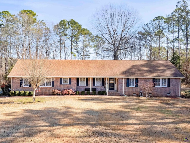 ranch-style home with a front yard