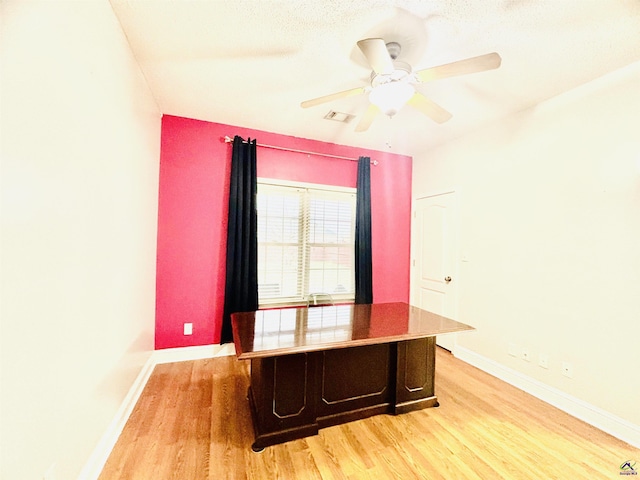 office featuring ceiling fan and hardwood / wood-style floors