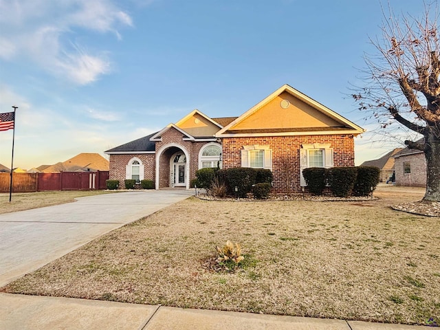 view of front of house with a yard