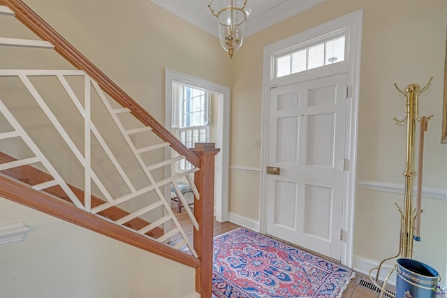 entrance foyer with crown molding