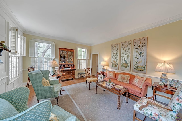 living room with crown molding and wood-type flooring