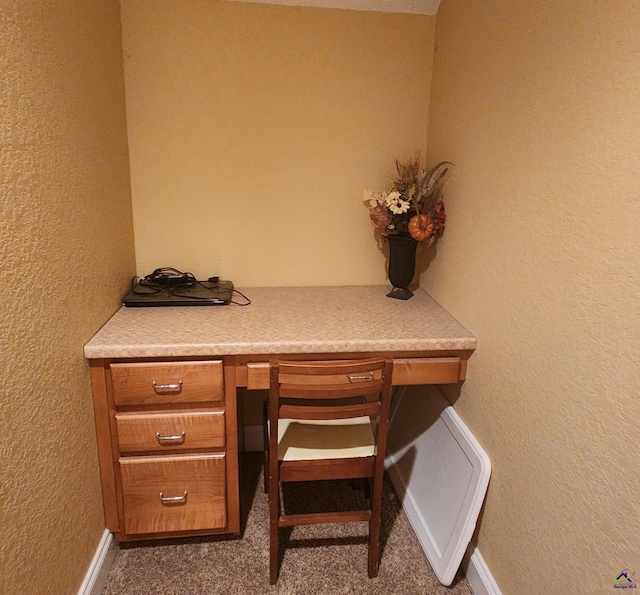 unfurnished office with built in desk