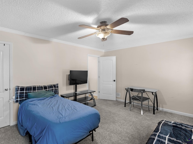 carpeted bedroom with ceiling fan, ornamental molding, and a textured ceiling