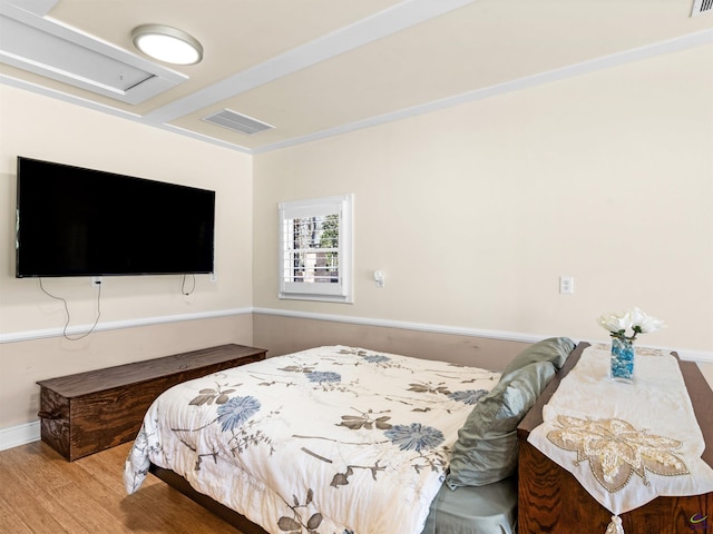 bedroom featuring wood-type flooring