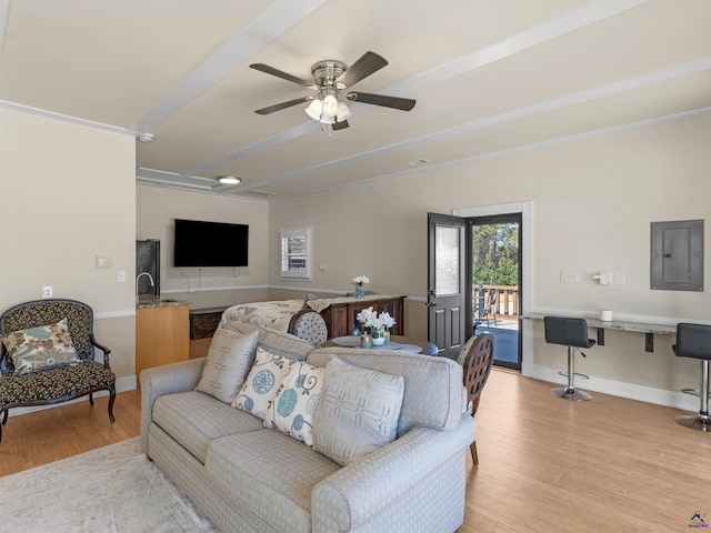 bedroom with built in desk, access to exterior, ceiling fan, electric panel, and light hardwood / wood-style floors