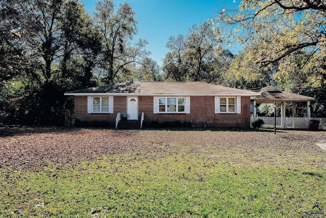 single story home with a front yard