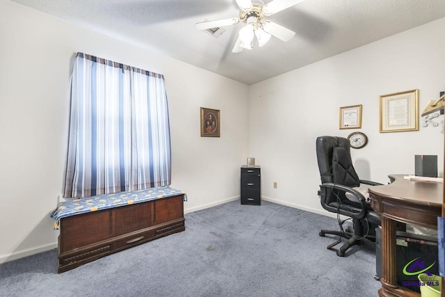 office area featuring carpet floors and ceiling fan