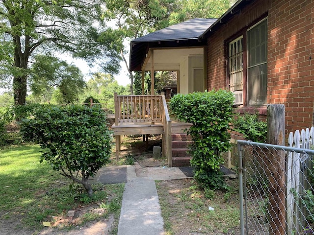 view of yard with a wooden deck