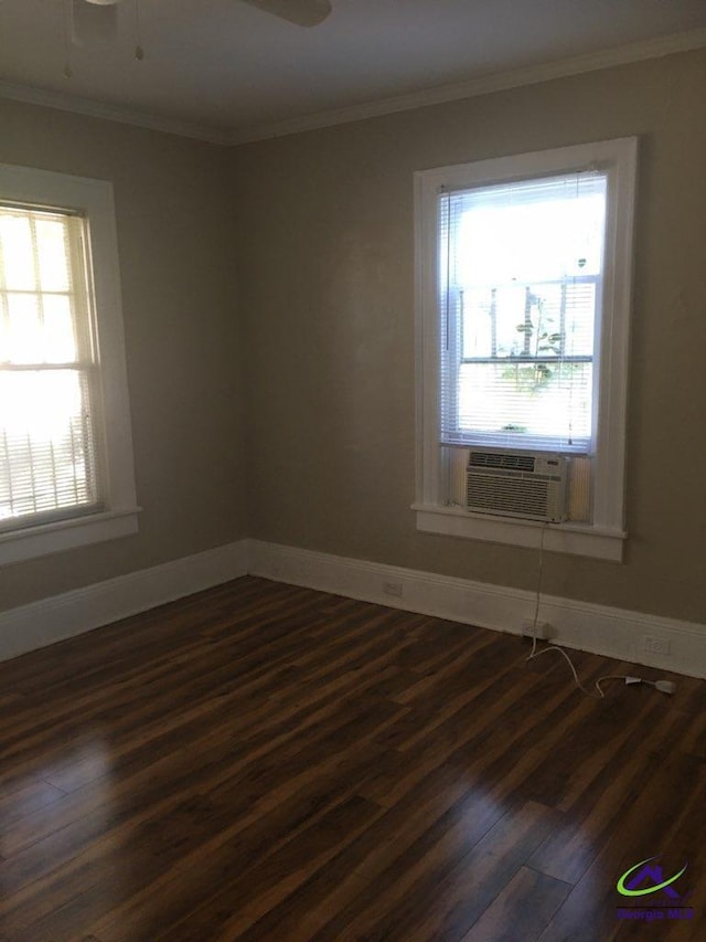 unfurnished room featuring dark wood-type flooring, ceiling fan, crown molding, and cooling unit