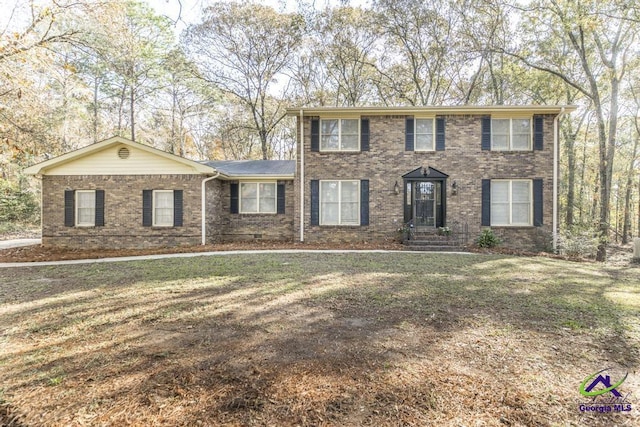 view of front of property featuring a front lawn