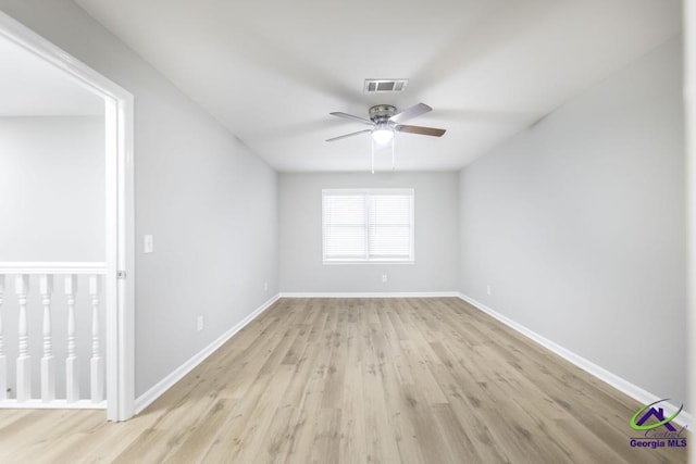 unfurnished room featuring ceiling fan and light hardwood / wood-style floors