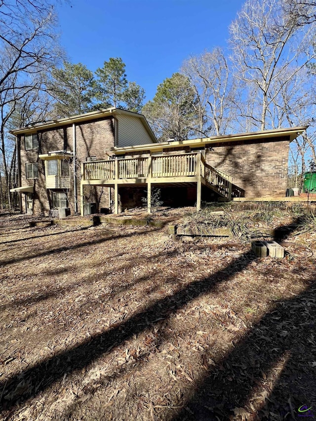 view of home's exterior with a deck