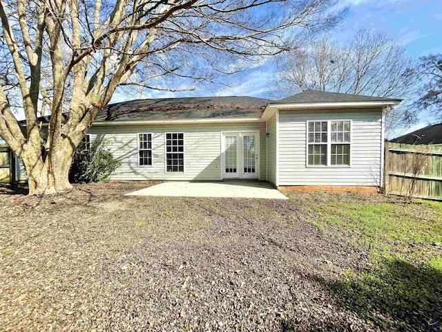 back of house with a patio area