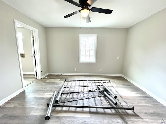 spare room with hardwood / wood-style flooring